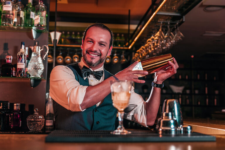 barman-is-making-cocktail-at-night-club-Y87KT9E.jpg